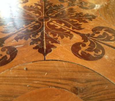 Restauro parquet antico a disegno con intarsio